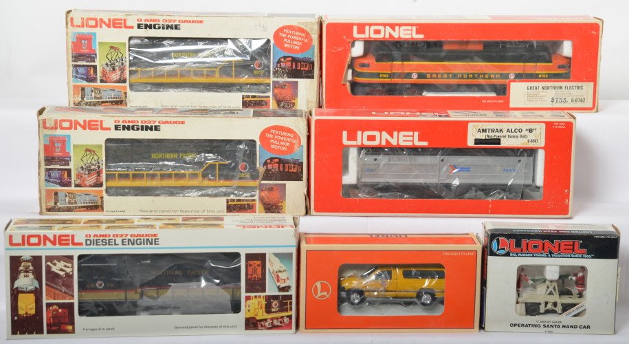 7 Lionel locos and motorized units 8762, 8679. 8858,: Lionel modern O gauge diesel locomotives and motorized units in OBs. Includes 8762 Great Northern electric, 8679 Northern Pacific GP-20, 8857 Northern Pacific U36B powered, 8858 Northern Pacific dummy