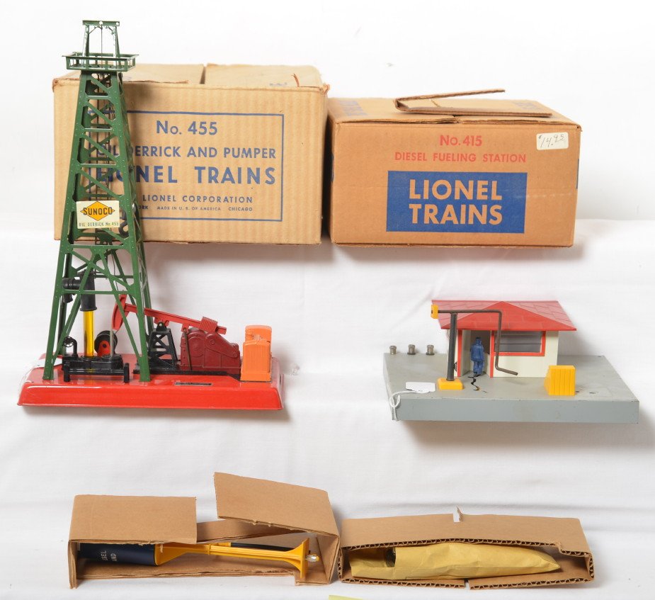 Lionel 455 oil derrick and pumper & 415 diesel fueling: Postwar Lionel O gauge operating accessories in original boxes. 455 oil derrick and pumper and 415 diesel fueling station. Accessories look C7. 415 has inserts and components. 455 box shows a little v