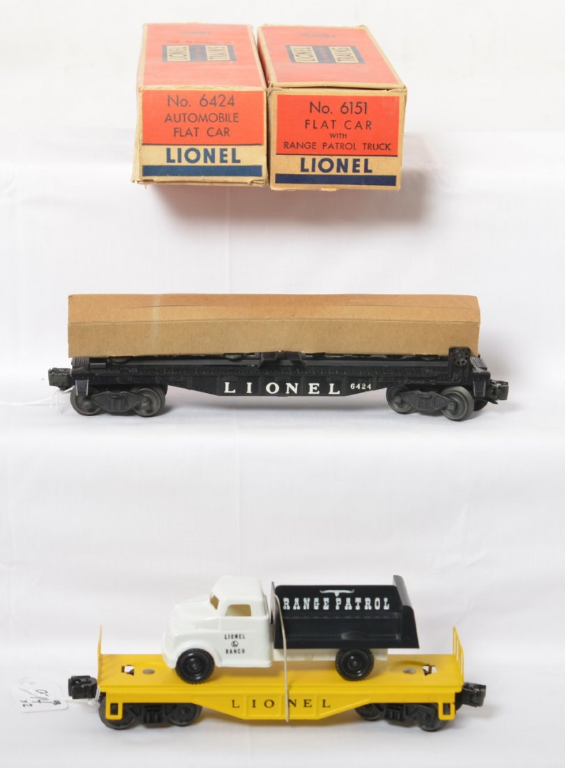 Lionel 6151 flat w/Range Patrol and 6424 flat w/cars in: Postwar Lionel O gauge 6151 flatcar with Range Patrol truck and 6424 automobile flatcar with autos in original sleeve. 6151 looks unrun C8. 6424 flat looks run C8-9. Boxes have very light wear, tape r