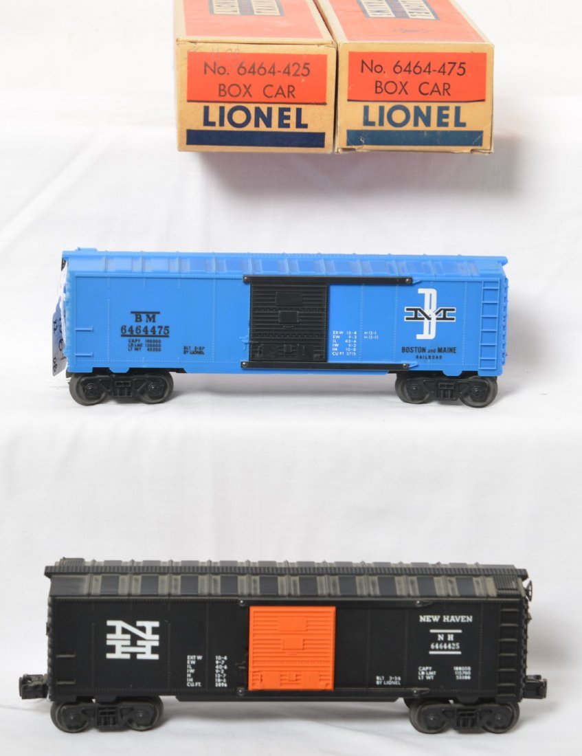 Nice Lionel 6464-425 NH, 6464-475 B&M in boxes: Lionel postwar O gauge 6464-425 Boston and Maine boxcar, type IV unpainted blue body, unrun, light shelf dust, C9+, OB missing an end flap. 6464-425 New Haven boxcar, type III body, light shelf dust, 