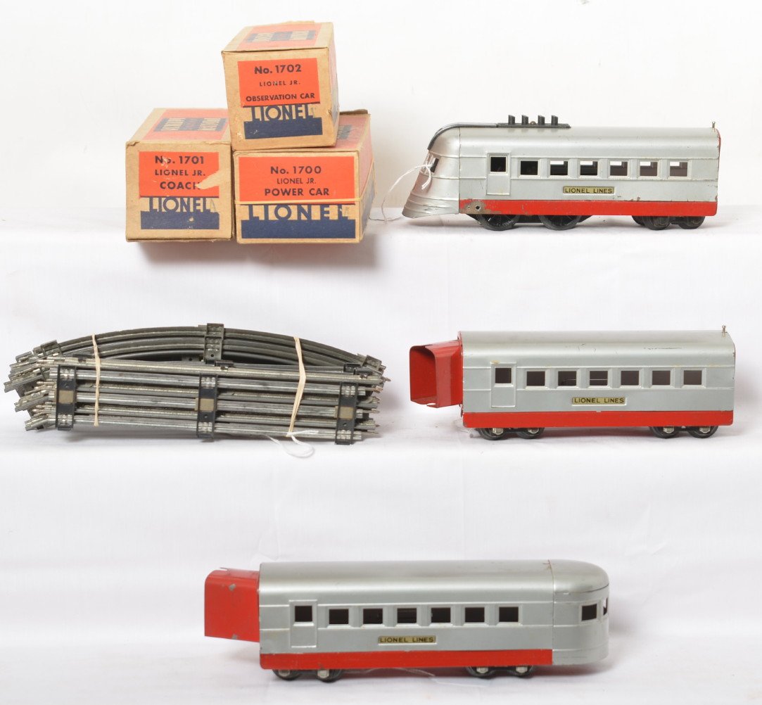 Lionel Jr. streamline diesel passenger set w/boxes: Prewar Lionel O gauge, Lionel Jr. streamline diesel articulated passenger train with 1700 power car, 1701 coach, and 1702 observation. Trains look Very nice C6+. O27 straight and curved sections of tr