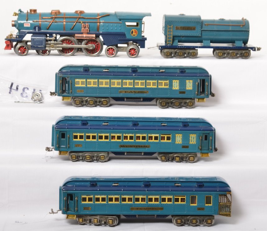 Lionel standard gauge Blue Comet passenger set: Prewar Lionel standard gauge Blue Comet passenger train set with 400E steam locomotive and tender with 420 Faye coach, 421 Westphal coach, and 422 Tempel observation. Trains look C6-7. Loco has reprod