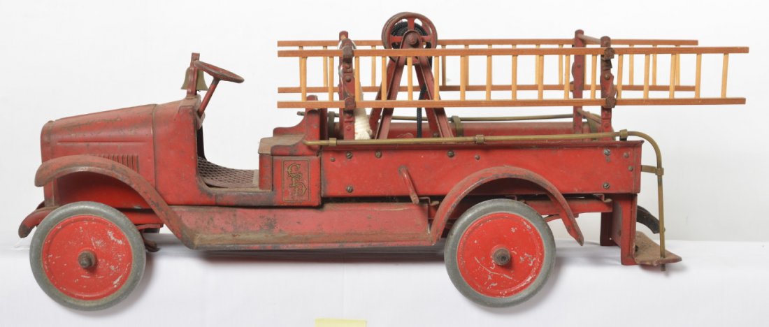 Buddy L Fire Department hook and ladder truck: Buddy L City Fire Department hook and ladder truck, light surface rust, missing parts, etc. Truck looks C6 area.