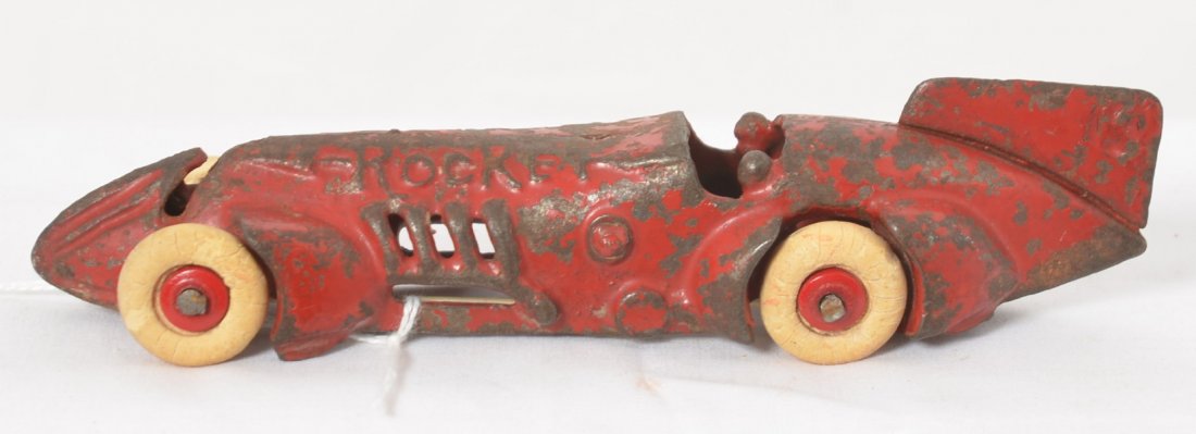 Cast Iron Rocket, Malcolm CampbellÃ•s Bluebird style: Cast Iron Rocket race car in the style of Sir Malcolm Campbell's 1930's Bluebird Land Speed Record Racers. Car measures 6-3/8 inches long. Car has the Kilgore style of axle/wheel retention. Car appear