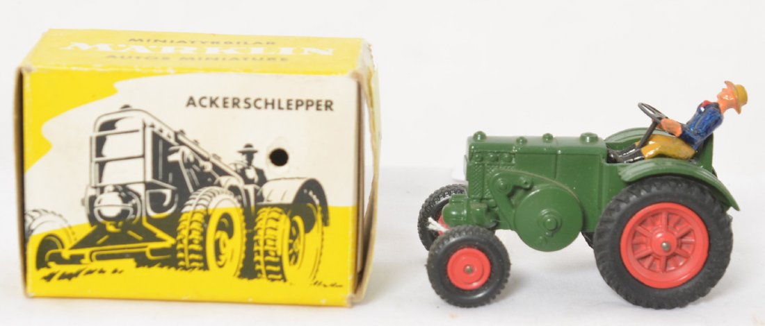 Marklin 8029 Ackerschlepper farm tractor in OB: Marklin Ackerschlepper 8029 Lanz Bulldog farm tractor in original box, C9-10 with original pin. Box has skinning on one end panel and a very small hole in a side panel. Box is very square and solid wi