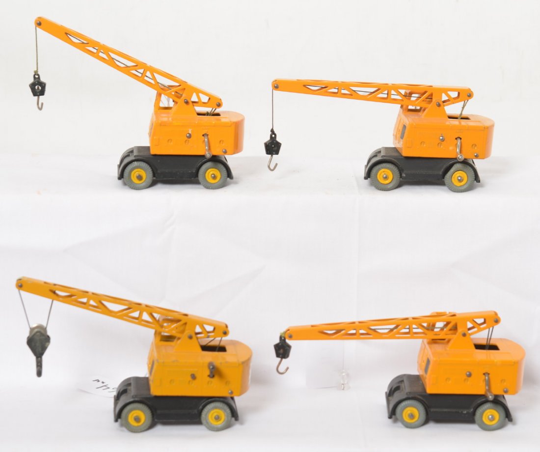 Four Dinky Supertoys Coles Mobile Cranes variation: Four Dinky Supertoys diecast Coles Mobile Cranes, some variations. Cranes appear to be in original paint. Nice clean lot.