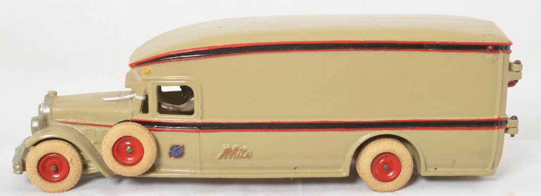 Arcade cast iron White delivery truck 251: Nicely restored Arcade cast iron 251 White delivery truck with driver and rubber tires, tires and driver appear to be original, rest looks restored. Approximately 13-1/2 inches long.