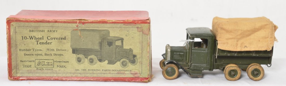 Britains No. 1432 Army Covered Lorry 10-Wheel in OB: Britains No. 1432 British Army Covered Lorry 10 wheel Tender with driver in original box. Pin point ding in engine cover. Truck appears to be in completely original condition. Box has some tattering t