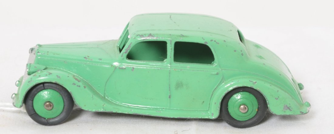 Dinky Toys Riley diecast auto 40A: Dinky Toys 40A Riley diecast automobile in original paint with nice original tires, one front has cracks. Car measures approximately 83mm long.
