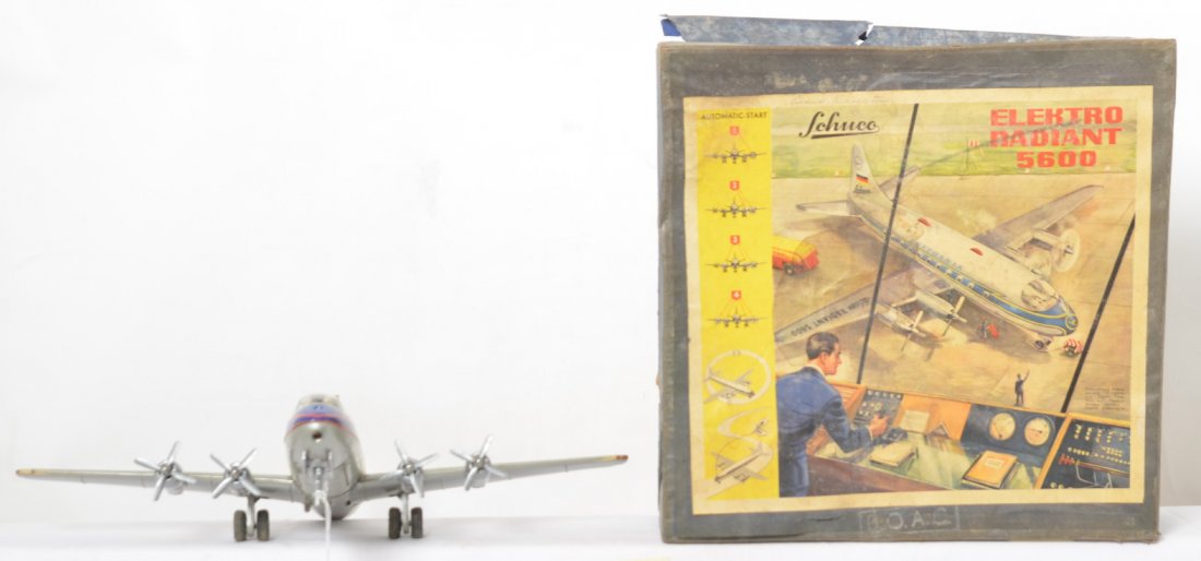 Schuco Elektro Radiant 5600 B.O.A.C. in OB: Schuco Elektro Radiant 5600 B.O.A.C. (British Overseas Airways Corporation) battery operated remote control airplane in original box. Lithographed tinplate airplane has a tiny bit of light surface rus