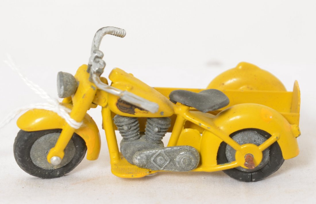 1950Ís-1960Ís Harley Davidson Duo style w/sidecar: 1950Ís - 1960Ís Harley Davidson Electra-Duo Glide style motorcycle with sidecar. A couple tiny touchups and some oxidation. Motorcycle has a repair to one side of handlebars. Measures approximately 