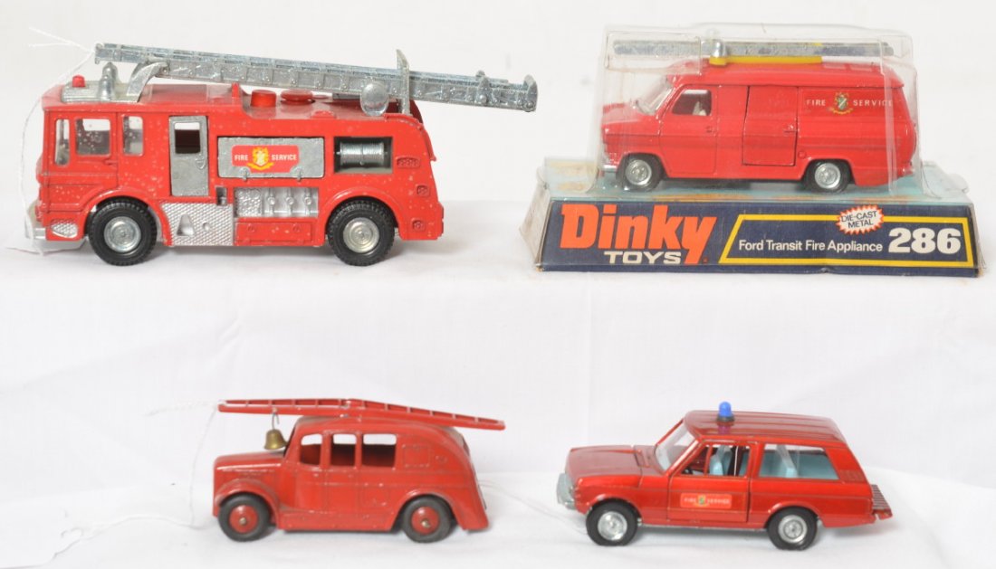 Dinky 286 in package, 285, Range Rover Fire Service: Dinky diecast toy vehicles, 286 Ford Transit Fire Appliance truck in original package. 285 Fire Service Merry Weather Marquis Fire Tender truck with ladders. Dinky Toys Range Rover Fire Service truck.
