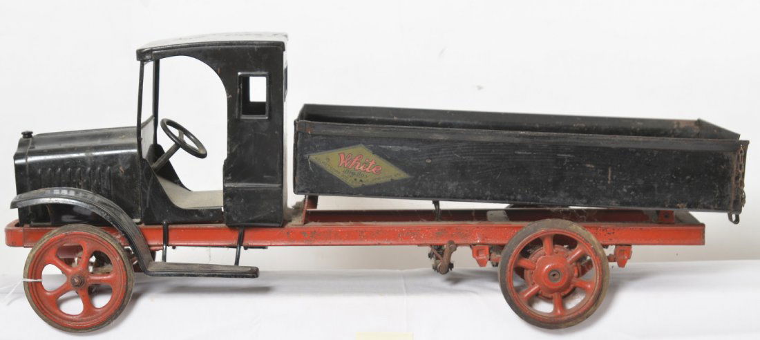 Kelmet Corp. White Big Boy dump truck pressed steel: Kelmet Corp. White Big Boy operating pressed steel dump truck. Cab appears to be repainted, bed may be repainted. Chassis appears to be original with flaking paint. Decals appear to be original. All p