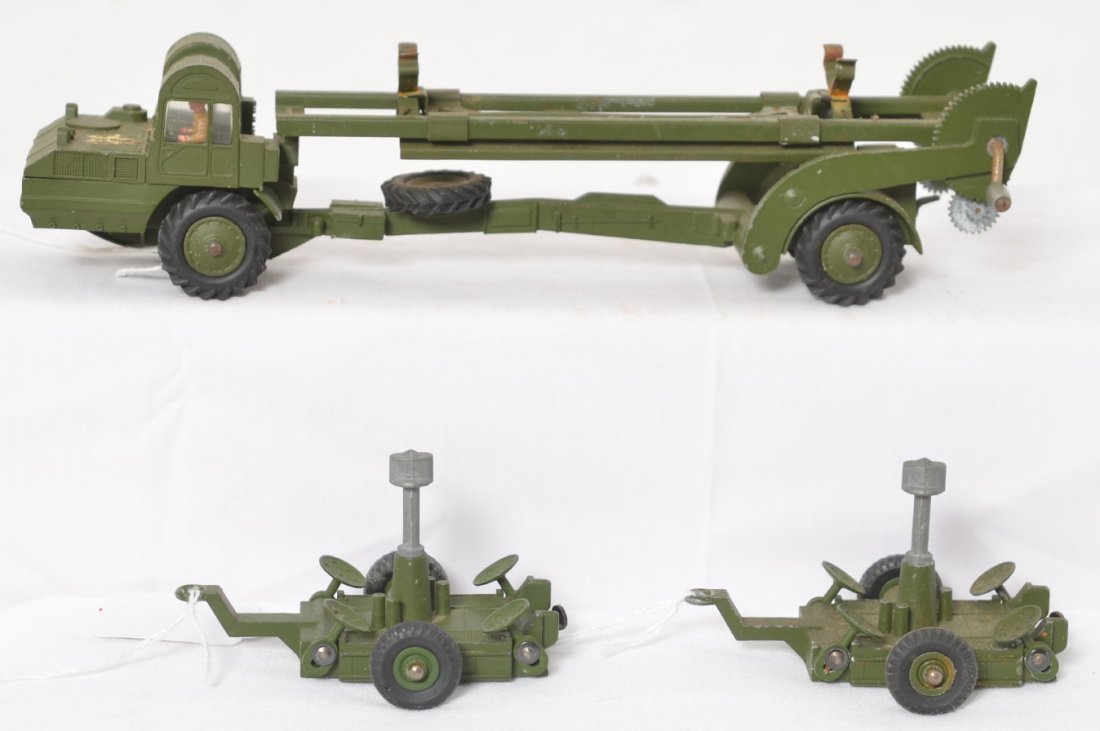 Dinky Toys Missile Erector, two Missile launching: Dinky Supertoys diecast toy military vehicle, Missile Erector vehicle/truck with two Missile launching platforms. Truck has some light surface rust and oxidation, one platform has a tiny bit of oxidat