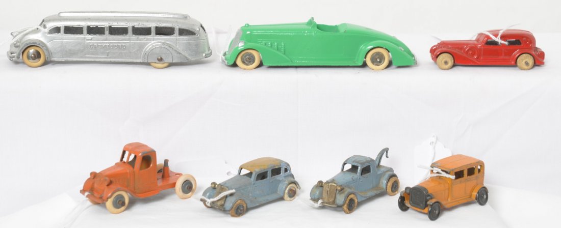 Tootsietoy Greyhound bus, trucks, cars, etc...: Tootsietoy diecast toy vehicles, late teens early 1920Ís Ford Sedan, Mack semi, Greyhound bus, convertible coupe, tow truck, and a 1930-40Ís sedan. Cars all appear to be in original condition with o