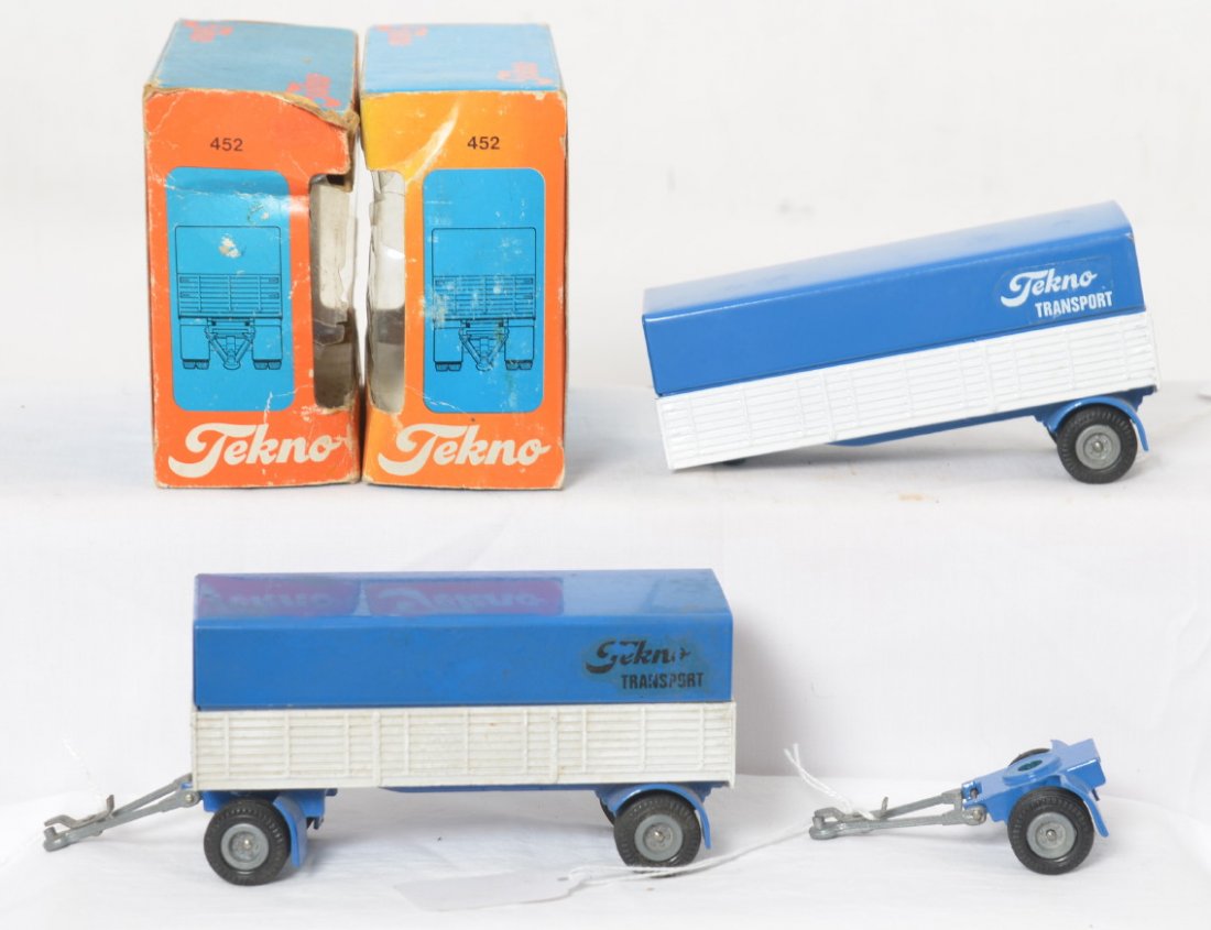 Two Tekno 452 Tekno Transport trailers in OB, New: Tekno Made in Denmark, diecast toy vehicles in original boxes. Two 452 Tekno Transport trailers. One has black livery and needs a little storage marks cleaned and polished. One has white markings on s