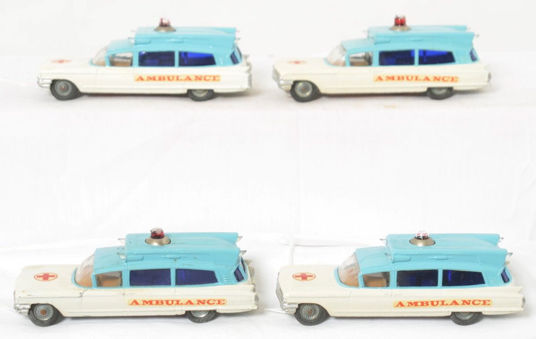 Four Corgi Superior Ambulance on Cadillac Chassis: Four diecast Corgi Superior Ambulance on Cadillac Chassis toy vehicles. Original paint and tires. Two have packing material (tissue/foam) stuck to dome. Cars look very clean, no battery damage, some c