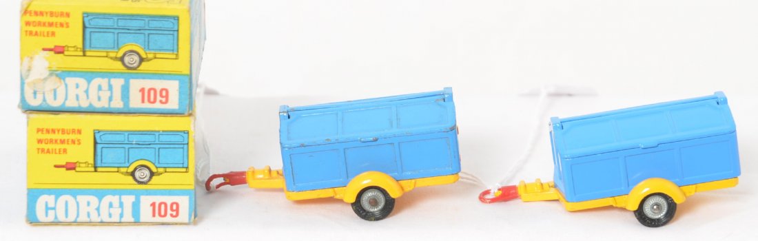 Two Corgi Toys 109 Pennyburn WorkmenÍs Trailers in OB: Two Corgi Toys 109 Pennyburn WorkmenÍs Trailers in original boxes. One shows a tiny bit of wear, no tools. One shows no wear, shovel and broom. Boxes show little wear.