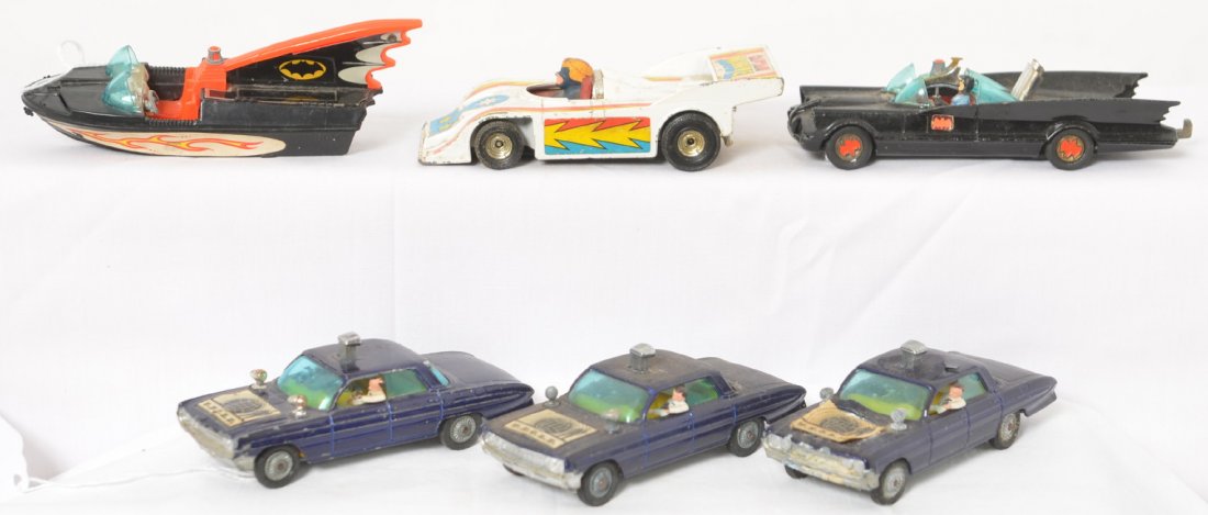 Corgi Toys Batman car & boat, U.N.C.L.E., Capt. Marvel: Corgi Toys diecast and plastic toy vehicles, original paint, tires, and played with condition. Some oxidation on some parts. Captain Marvel Porsche Audi, Batman Batmobile, Glastron Batboat, three U.N.