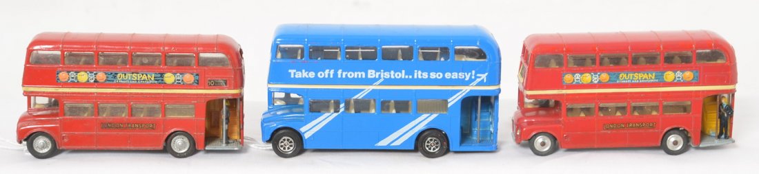 Corgi Toys, two Outspan London Transport, Bristol bus: Corgi Toys diecast toy busses, two Outspan London Transport Routemaster and Bristol Bus, original paint and tires. All appear to be in original played with condition. Some splits, some flats