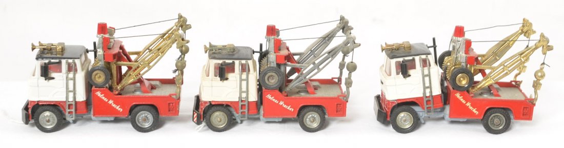 Three Corgi Toys Ford Holmes semi wrecker trucks: Three Corgi Toys diecast toy Ford Holmes semi wrecker trucks. Played with condition, original paint and tires. No flats or splits.