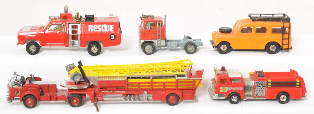 Five Corgi Toys diecast trucks, fire, rescue, safari,: Five Corgi Toys diecast toy trucks, two fire, one rescue, one safari, and one semi. All are in played with condition. Original paint and tires. No flats or splits.