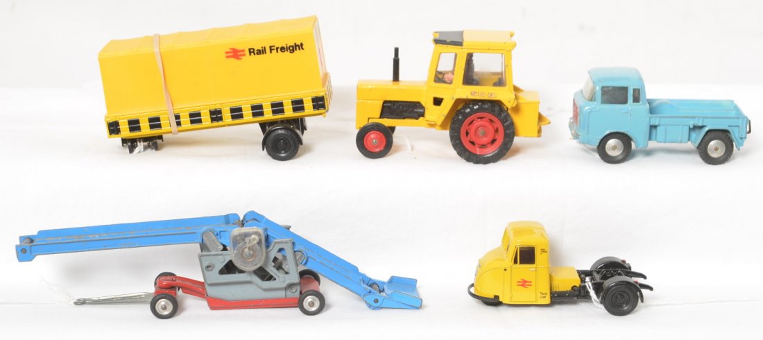 Corgi Toys, 409, MF50B, Scammel Scarab more: Corgi Toys diecast toy vehicles Scammel Scarab, 409 Jeep FC-150, elevator, and Massey Ferguson MF50B. Jeep has some touchups, otherwise original paint and tires. Elevator tires have some very tight sp