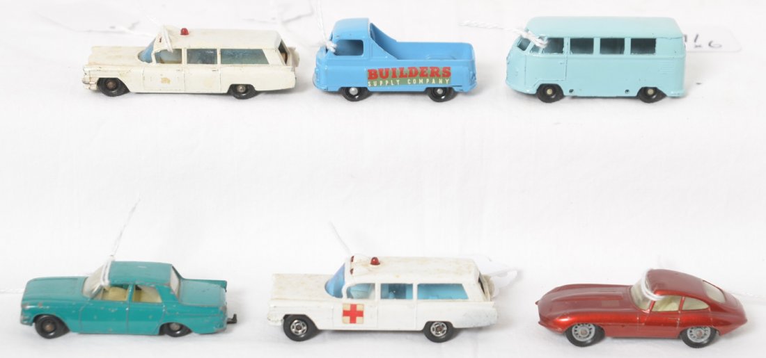 Matchbox Lesney 33, 60, 12, 32, 54, 54: Diecast Matchbox made by Lesney toy cars, No. 33 Ford Zephyr 6, two 54 S&S Cadillac Ambulance (older variation has small touchups), 32 E Type Jaguar, 12 Volkswagen Micorbus, and No. 60 Morris Builders