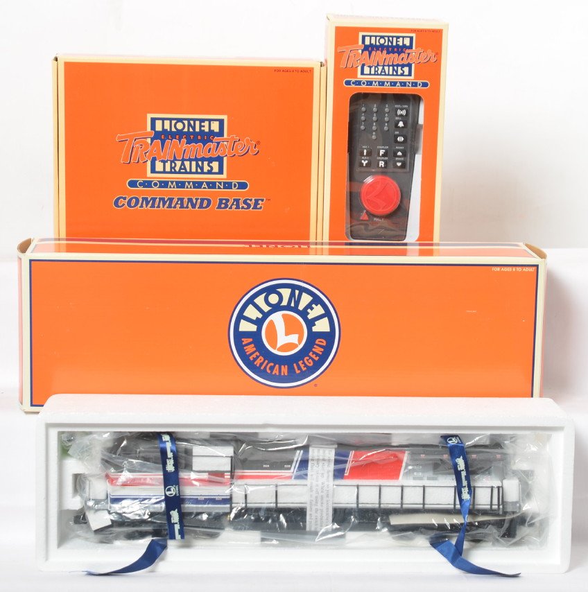 Lionel 18252 Amtrak Dash-9 command set: Lionel modern O gauge 18252 Amtrak Dash 9 command set in OB. Loco features TMCC, Railsounds, Electrocouplers, and much more. Also includes TMCC command base and Cab-1 remote. Loco is factory wrapped i