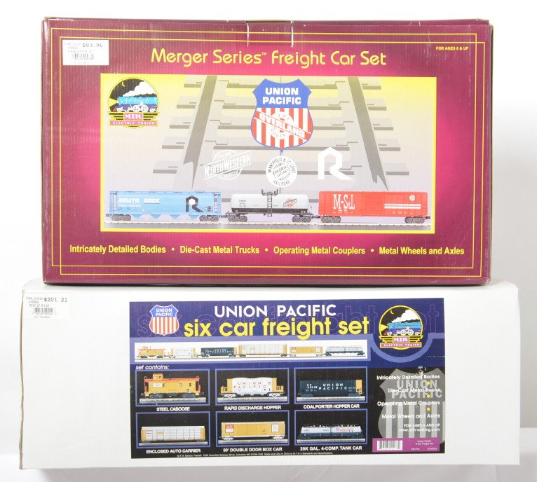 MTH Union Pacific six car and three car freight packs: MTH modern O gauge Union Pacific freight packs in OBs. Includes 90022 six car set and 90033 three car set. Trains are C8-9 with little if any run time.