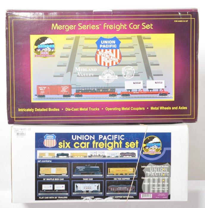 MTH Union Pacific six car and three car freight packs: MTH modern O gauge Union Pacific freight packs in OBs. Includes 90023 six car set and 90037 three car set. Trains are C8-9 with little if any run time.