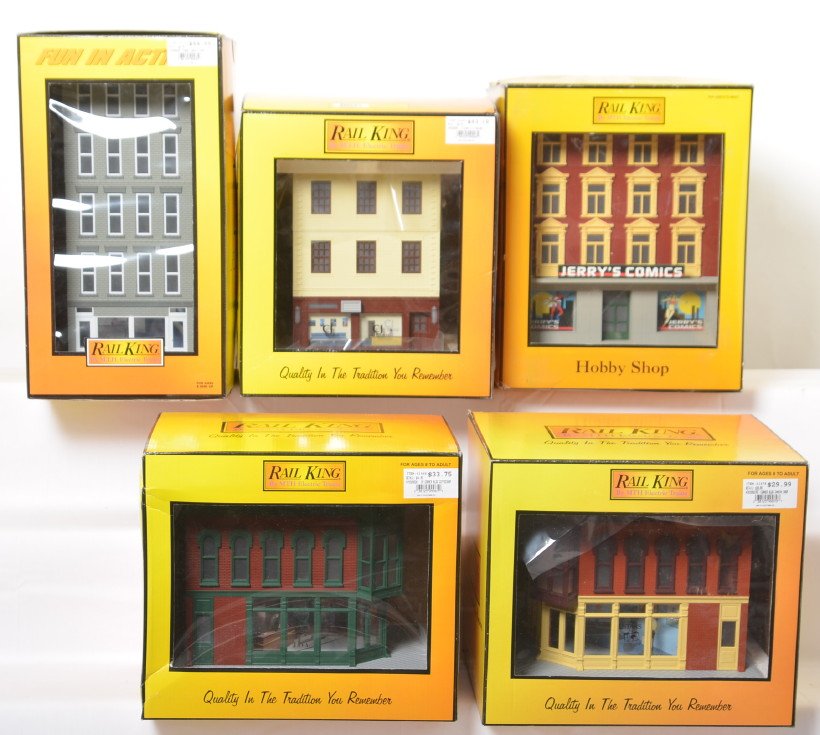 5 Railking buildings textile, Jerry's Comics, Forbes: MTH Railking modern O gauge buildings in OBs. Five buildings include 90228 JerryÍs Comics, 90070 Camera Shop, 90061 coffee shop, 90035 Forbes Tower, and 9096 CJ Textiles. Buildings are C9-10, a few O