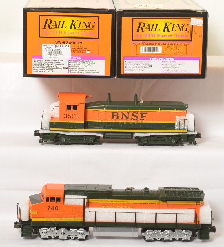 Railking BNSF NW-2 switcher and Dash-8 with Proto: MTH Railking modern O gauge BNSF diesel locomotives in OBs. Includes 30-2129-1 Dash-8 diesel locomotive with Protosound and 30-2169-1 SW-9 switcher with Protosound. Both locos are C8+ with light run t