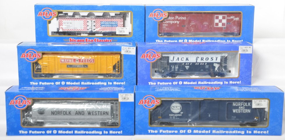 6 Atlas O freight cars Purina, N&W, Jack Frost, etc: Atlas modern O gauge freight cars in OBs. Six cars include 6504-1 Ralston boxcar, 6707-1 Ralston refrigerator, 6356-1 Jack Frost hopper, 6381-2 Wayne Feeds hopper, 6533-1 Norfolk and Western auto part