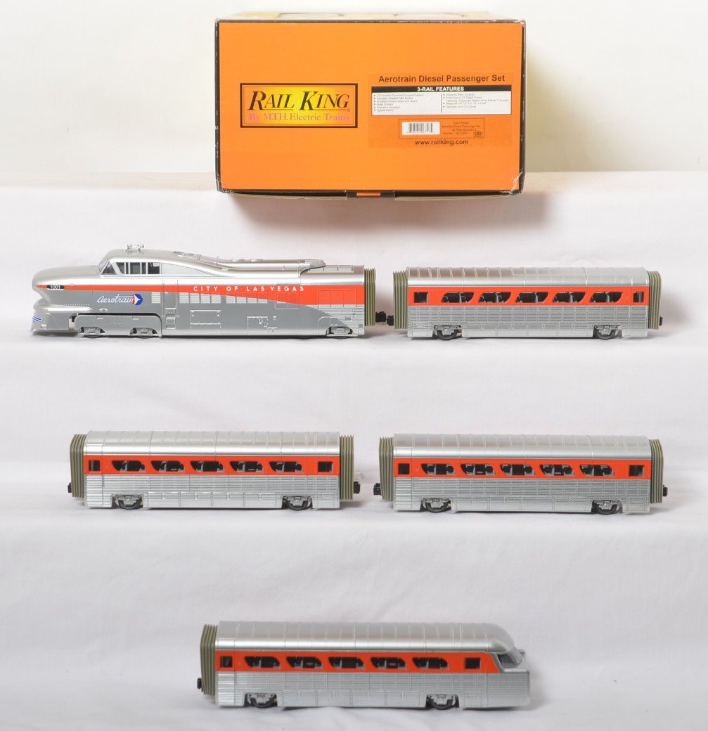 Railking Union Pacific Aero Train with Proto 2: MTH Railking modern O Gauge Union Pacific Aero Train in OB with add on coach. Catalog number is 30-2376-1. Set features Protosound 2.0, DCS control, and more. Set is C8 condition with light run time. 