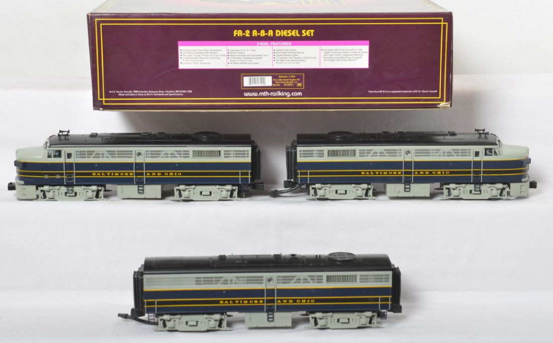 MTH B&O Alco FA A-B-A with Proto 2: MTH modern O gauge 20-2239-1 Baltimore and Ohio Alco FA-2 A-B-A diesel locomotive set in OB. Loco features Protosound 2.0, DCS control, Protosmoke, Protocouplers, and more. Locos are C8+ with very lig