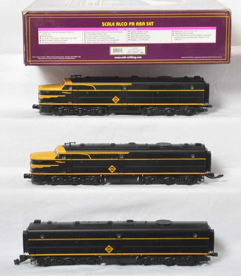 MTH Erie Alco PA A-B-A with Proto 2: MTH modern O gauge 20-2387-1 Erie Alco PA A-B-A diesel locomotive set in OB. Loco features Protosound 2.0, DCS control, Protosmoke, Protocouplers, and more. Locos are C8 with run time. OB has some lig