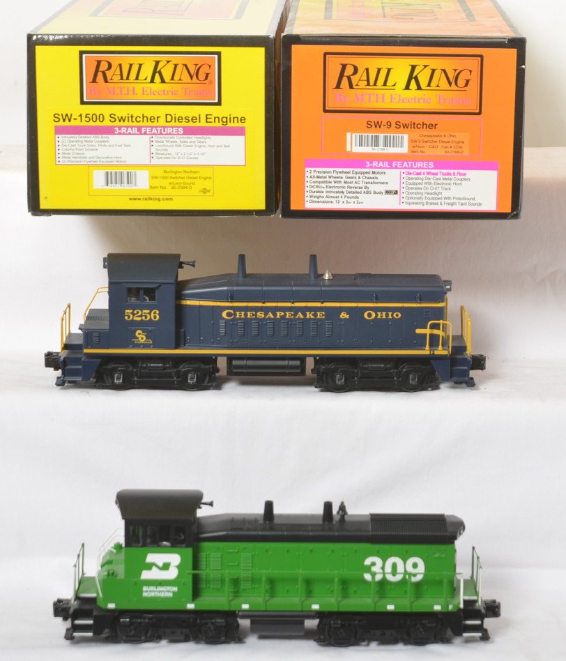 Railking Burlington Northern and C&O switchers: MTH Railking modern O gauge Burlington Northern and Chesapeake and Ohio switchers in OBs. Includes 30-2168-0 Chesapeake and Ohio with Horn and 30-2394-0 Burlington Northern with Loco Sound. Locos are 