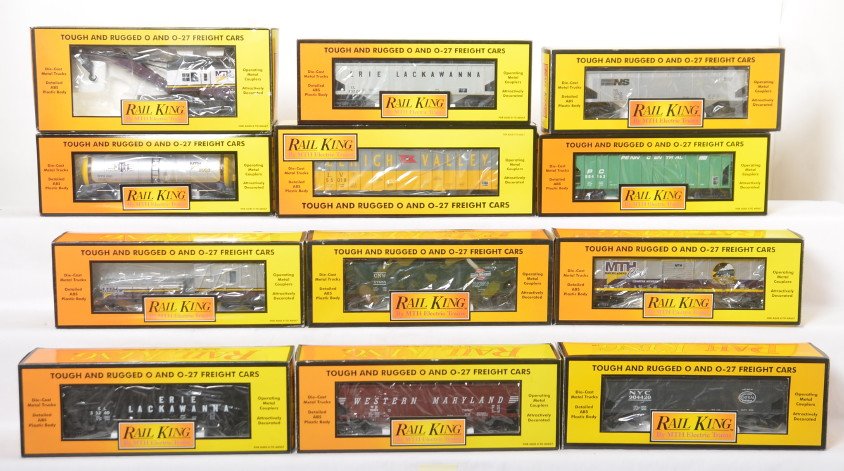 12 Railking freight cars 7928, 7523, 7510, 7559, etc: MTH Railking modern O gauge freight cars in OBs. Twelve cars include 7380 MTH Club tank car, 7423 club boxcar, 7928 club crane, 7939 club crane tender, 7511 Chicago and Northwestern hopper, 7513 New Y