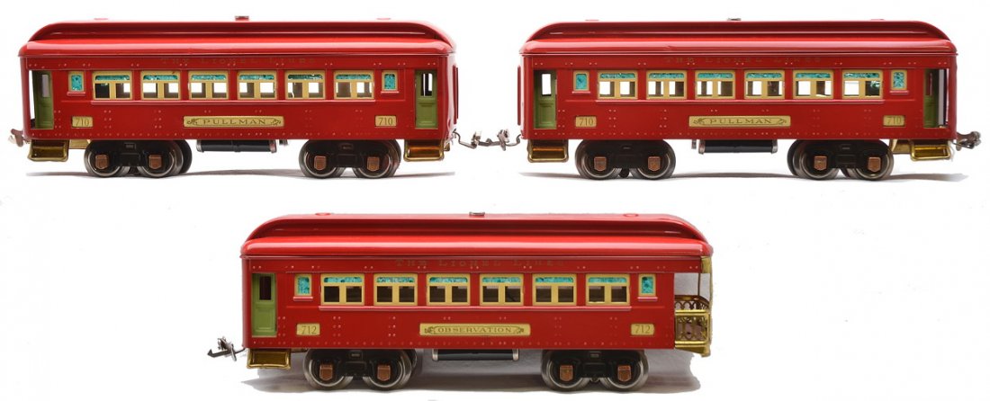 Lionel Prewar Red Passenger Cars 710 710 712: Lionel prewar O gauge red passenger cars with apple green doors, cream inserts and copper journals including; two 710 Pullmans and a 712 observation. The cars have been professionally restored to look