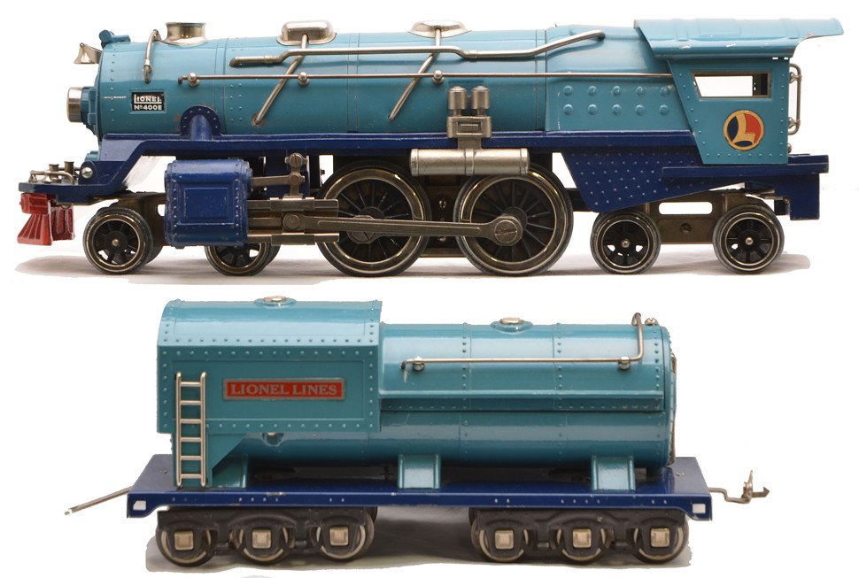 Lionel Blue Comet 400E Loco 400W Tender: Lionel prewar standard gauge Blue Comet 400E steam loco and 400W tender both with all nickel trim. The loco has been rewheeled. Loco has paint nicks with the largest on the edge of the cab roof. The d