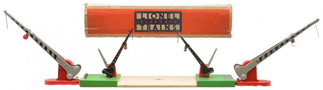 Lionel 47 Crossing Gate OB 2-152 Crossing Gates: Lionel prewar O gauge 47 crossing gate in OB that is missing all flaps. Also included are two 152 automatic crossing gates with red die-cast bases. The accessories are C7.