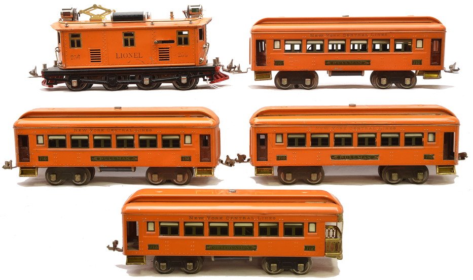 Lionel Prewar Orange Passenger Set no. 268: Lionel prewar O gauge orange passenger set no. 268 containing; 256 rubber-stamped electric loco with brass inserts, two 710 Pullman cars and a 712 observation. Also included is a extra 710 Pullman. Th