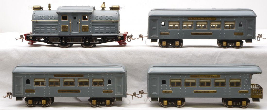 Ives Gray Greyhound Passenger Set no. 507R: Ives prewar O gauge gray Greyhound passenger set no. 507R, circa 1926 including; 3257R electric loco, two 141 Parlor cars and a 142 observation. The cars have brass inserts, plates and journals. Each