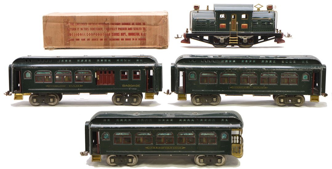 Lionel Dark Green Passenger Set no. 348E: Lionel prewar standard gauge dark green passenger set no. 348E including; 380E electric loco with red lettered brass plates in a worn OB, 429 baggage/Pullman car, 428 Pullman and a 430 observation. Th