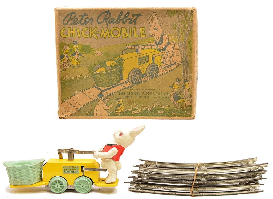 Lionel 1103 Peter Rabbit Chick-Mobile Hand Car: Lionel prewar O gauge 1103 Peter Rabbit Chick-Moblie wind-up hand car with eight curve track sections in OB. The basket on the hand car does have some rubs, otherwise the car is C8. The OB has nice co