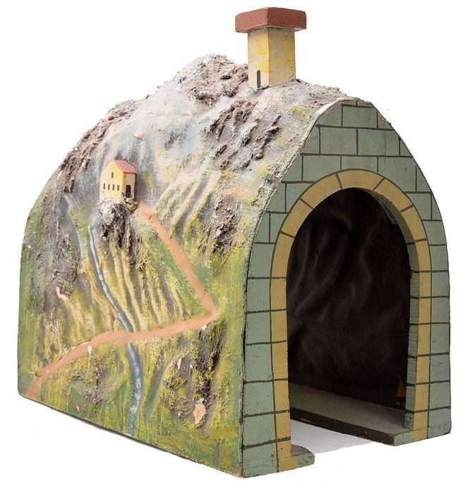 Marklin Gauge 1 Wooden and Composition Tunnel: Marklin prewar gauge 1 wooden and composition tunnel which measures 15 inches in length, 9 inches wide with an 8 inch high opening. Tunnel has a large crack on one side and a small crack on the other 