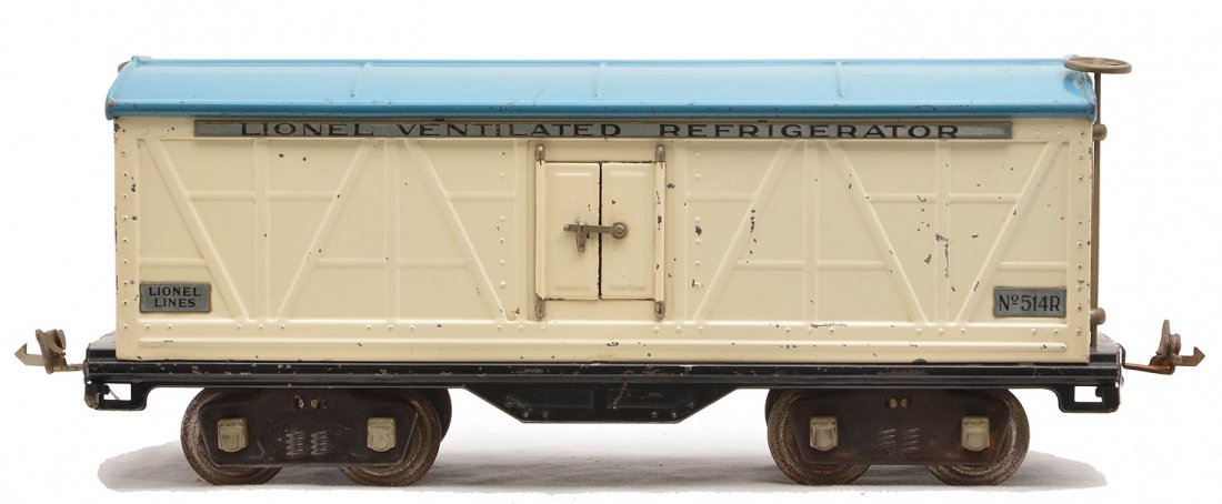 Lionel 514R White Refrigerator Car w/Lt.Bl. Roof: Lionel prewar standard gauge 514R white refrigerator car with light blue roof, nickel trim and journals. Couplers, trucks and wheels have surface rust. Overall the car is C6 and the roof is C7.