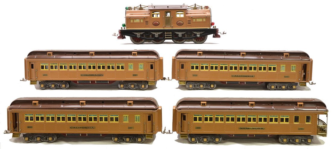 Lionel 2-Tone Brown State Pass Set no. 411E: Lionel prewar standard gauge two-tone brown State passenger set no. 411E containing; 408E electric loco with red lettered brass plates, two 412 California Pullmans, 413 Colorado Pullman and a 416 New 