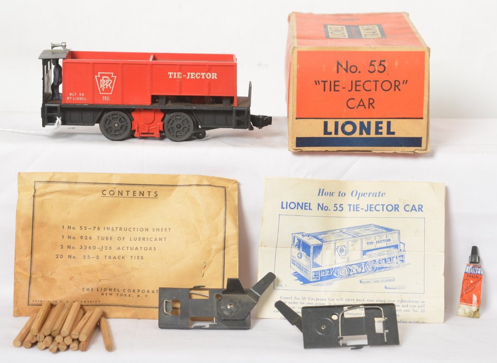 Lionel 55 Tie-Jector car in OB w/components: Postwar Lionel O gauge No. 55 Tie-Jector operating motorized unit in original box with components and envelope. Train should clean to look lightly run C7. Box looks C8 area.
